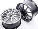 Pair of Neuspeed 11 spoke automotive alloy wheels with RS center caps.