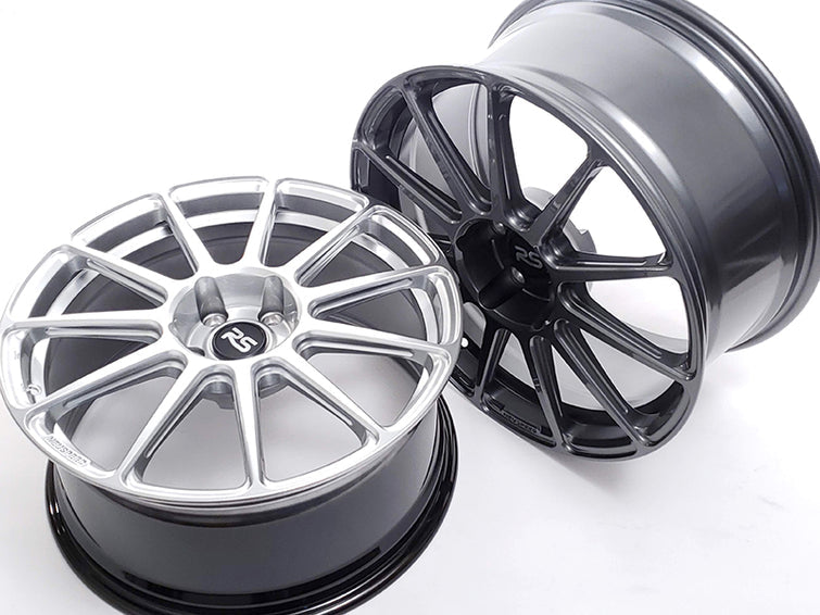 Pair of Neuspeed 11 spoke automotive alloy wheels with RS center caps.