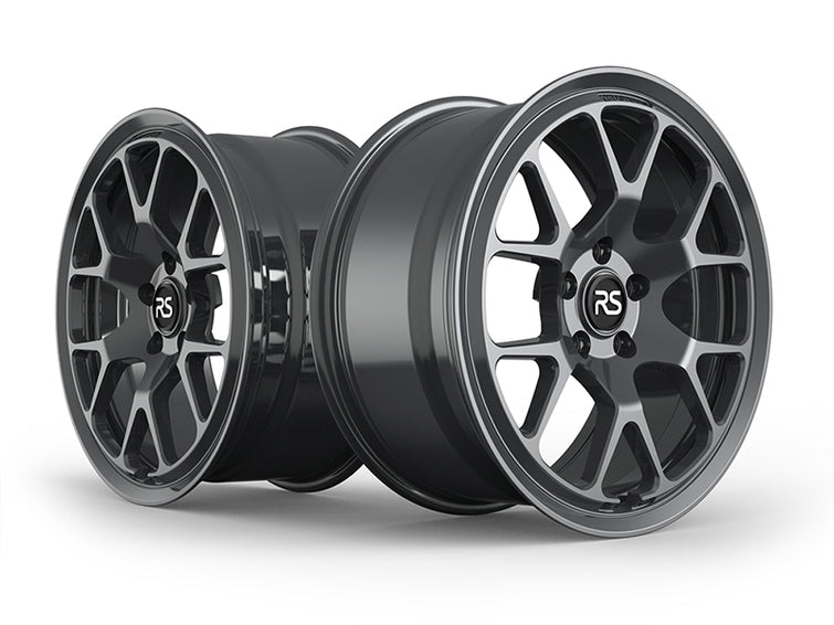 Two Neuspeed split Y spoke automotive alloy wheels with RS logo center caps.