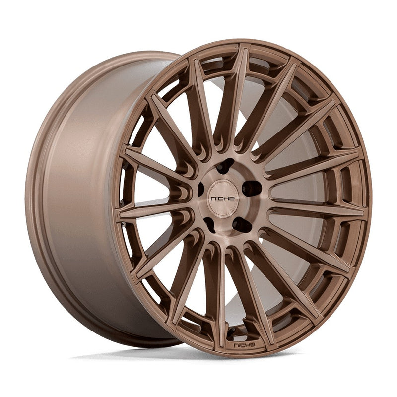 Niche Amalfi monoblock cast aluminum 15 spoke automotive wheel in a platinum bronze finish with an embossed Niche logo on the outer lip and a Niche logo center cap.