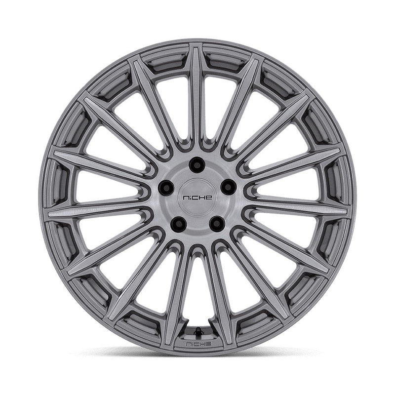 Front face view of a Niche Amalfi monoblock cast aluminum 15 spoke automotive wheel in a platinum finish with an embossed Niche logo on the outer lip and a Niche logo center cap.