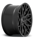 Side view of a Niche Mazzanti monoblock cast aluminum automotive wheel in a matte black finish with a Niche logo embossed in the outer edge and with a Niche logo center cap.