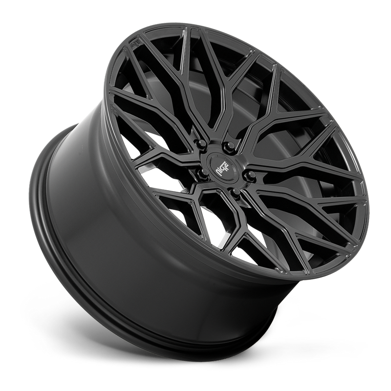 Tilted side view of a Niche Mazzanti monoblock cast aluminum multi spoke concave profile automotive wheel in a matte black finish and Niche silver logo center cap.