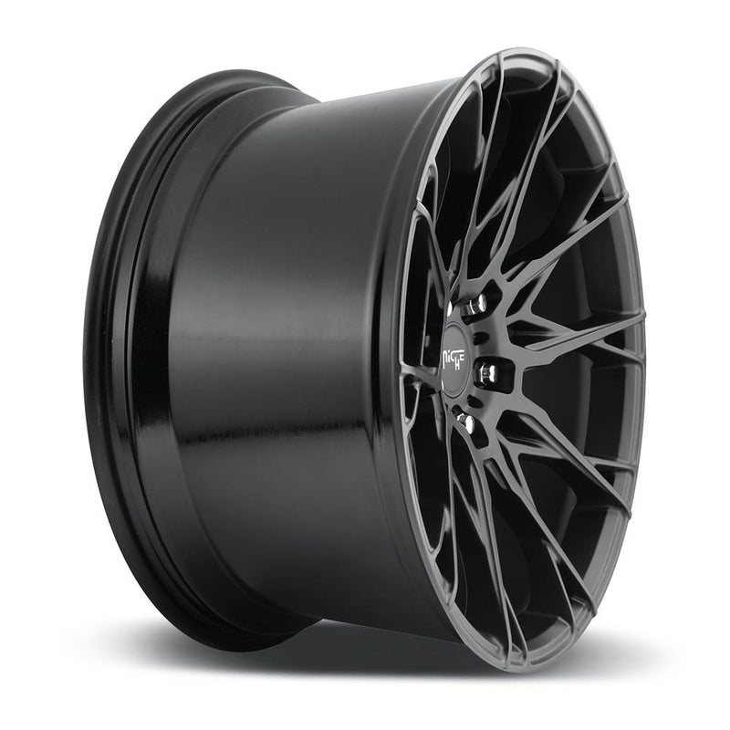 Side view of a Niche Staccato monoblock cast aluminum 10 cross spoke design automotive wheel in a matte black finish with a Niche silver logo center cap.