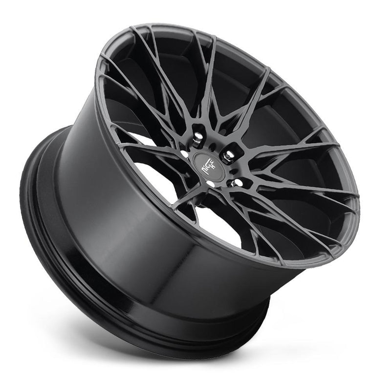 Tilted side view of a Niche Staccato monoblock cast aluminum 10 cross spoke design automotive wheel in a matte black finish with a Niche silver logo center cap.