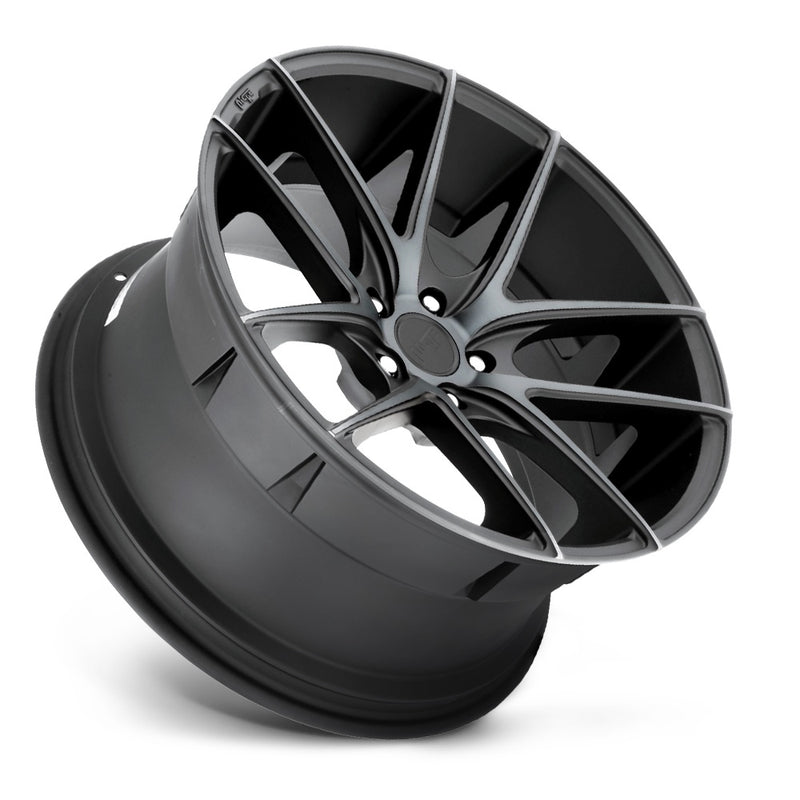 Tilted side view of a Niche Targa monoblock cast aluminum 5 double spoke automotive wheel in a matte black double dark tint finish with embossed Niche logo on outer edge and Niche logo center cap.