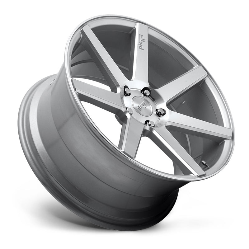 Tilted side view of a Niche Verona monoblock cast aluminum 7 spoke concave profile automotive wheel in a gloss silver machined finish with an embossed Niche Logo on one spoke and a Niche silver logo center cap.