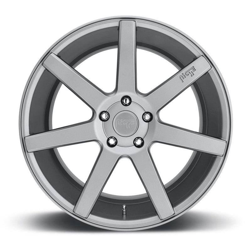 Front face view of a Niche Verona monoblock cast aluminum 7 spoke concave profile automotive wheel in a matte gun metal gray finish with an embossed Niche Logo on one spoke and a Niche logo center cap.