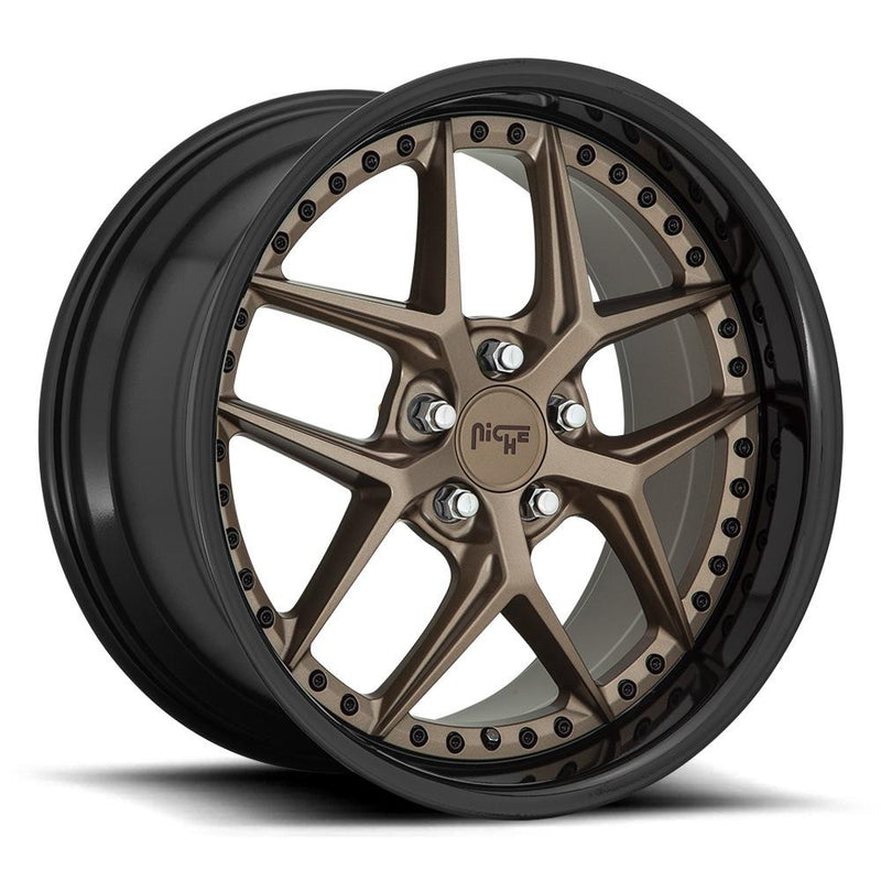 Niche Vice monoblock cast aluminum 5 Y spoke automotive wheel in a matte bronze finish with a black bead ring and a stud pattern around the inner bead ring.