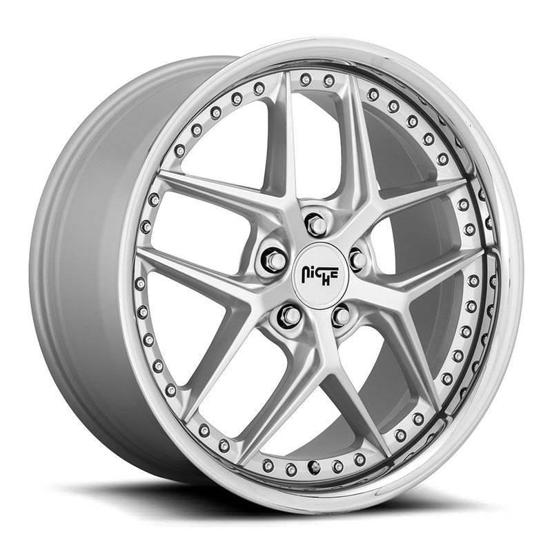 Niche Vice monoblock cast aluminum 5 Y spoke automotive wheel in a matte silver finish with a stud pattern around the inner bead ring and a Niche black logo center cap.