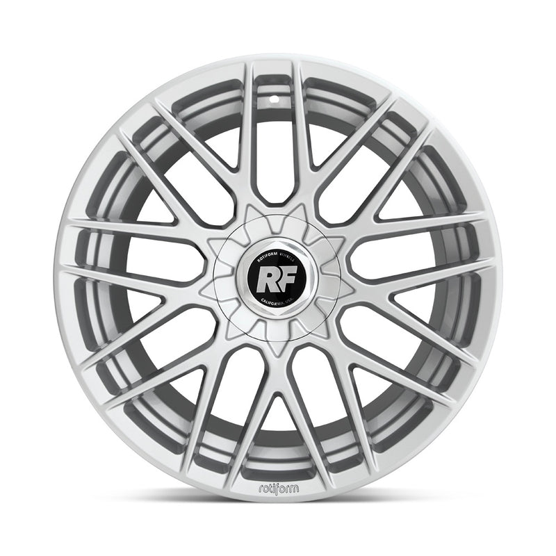 Front face view of a Rotiform RSE monoblock cast aluminum 9 V-shaped spoke automotive wheel in gloss silver with a Rotiform RF logo center cap and Rotiform logo embossed on outer lip.