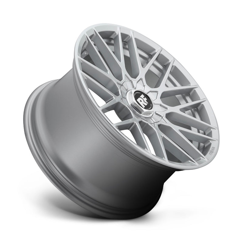 Tilted side view of a Rotiform RSE monoblock cast aluminum 9 V-shaped spoke automotive wheel in gloss silver with a Rotiform RF logo center cap and Rotiform logo embossed on outer lip.