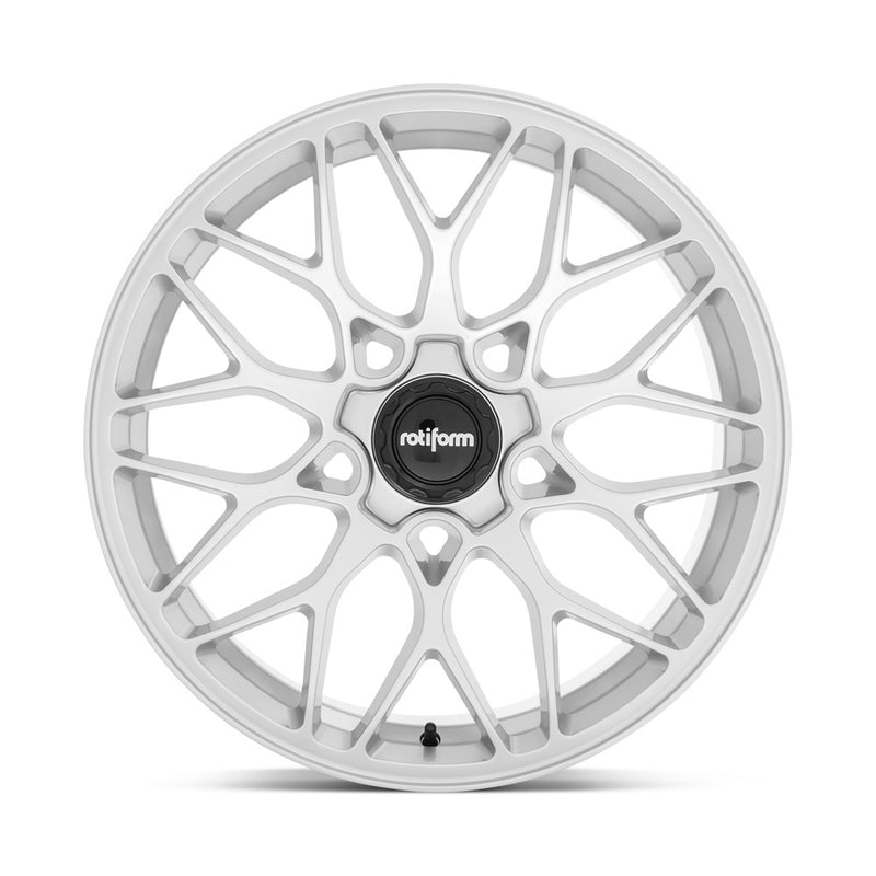 Front face view of a Rotiform SGN monoblock cast aluminum 10 spoke automotive wheel in a gloss silver finish with a black center cap with a silver Rotiform logo.