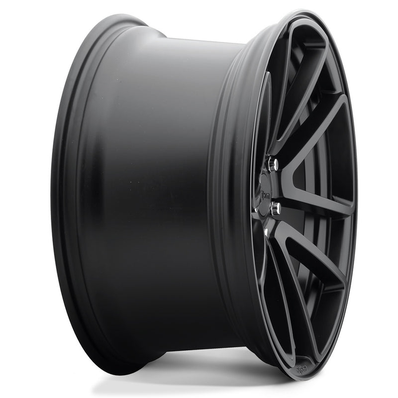 Side view of a Rotiform SPF monoblock cast aluminum 5 double spoke design automotive wheel in a matte black finish with an embossed Rotiform logo on the outer edge lip and a black Rotiform logo center cap.