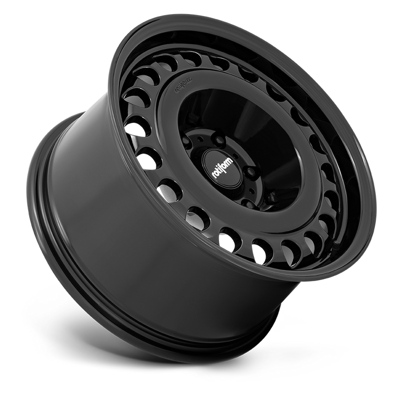 Tilted side view of a Rotiform STL monoblock cast aluminum automotive wheel in a gloss black with a 20 hole face pattern with Rotiform logo center cap.