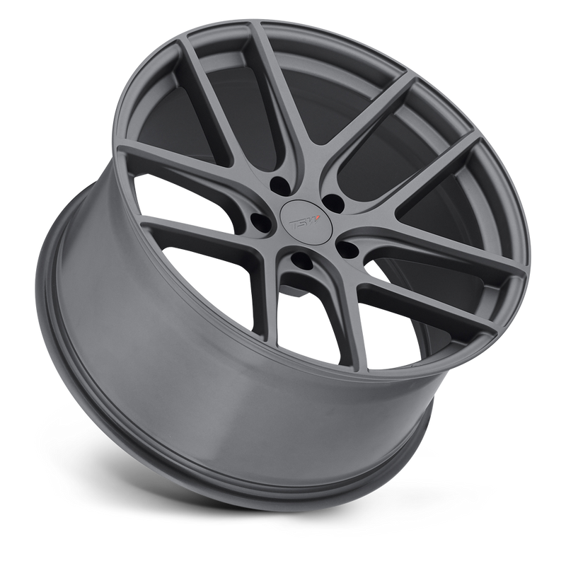 Tilted Side View Of A TSW Geneva 1 Piece Rotary Forged Aluminum, 5 Double Spoke Design Automotive Wheel In A Matte Gun Metal Gray Finish With A TSW Logo Center Cap.