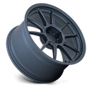 Tilted side view of a TSW Imatra flow formed wheel in a satin dark blue finish having a split 5 spoke design with a deep recessed lug bowl and a TSW logo center cap.