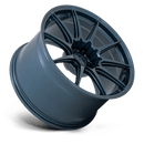 Tilted side view of a TSW Kemora flow formed 10 spoke concave profile automotive aluminum wheel in a gloss dark blue finish with a TSW logo center cap.
