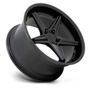 Tilted side view of a TSW Launch cast aluminum wheel in a matte black with gloss black lip finish having a 5 spoke design with spoke scalloping and a deep flat lip.