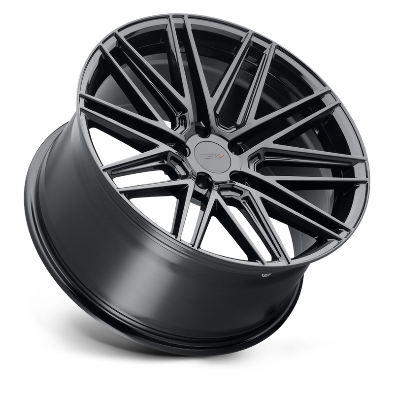 Tilted side view of a TSW Pescara cast aluminum multi spoke automotive wheel in a gloss black finish with a TSW logo center cap.