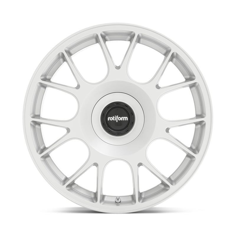Front face view of a Rotiform TUF-R monoblock cast aluminum 7 spoke design automotive wheel in satin silver finish with a black center cap with a silver Rotiform logo.