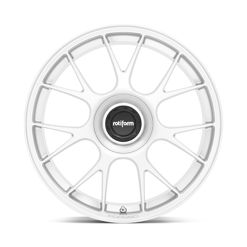 Front face view of a Rotiform TUF a monoblock forged aluminum 7 Y shape spoke automotive wheel in a gloss silver finish with the word Forged embossed in the bead ring and a black center cap with a silver Rotiform logo.