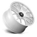 Tilted side view of a Rotiform TUF a monoblock forged aluminum 7 Y shape spoke automotive wheel in a gloss silver finish with the word Forged embossed in the bead ring and a black center cap with a silver Rotiform logo.