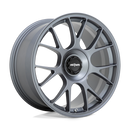 Rotiform TUF a monoblock forged aluminum 7 Y shape spoke automotive wheel in a satin titanium finish with the word Forged embossed in the bead ring and a black center cap with a silver Rotiform logo.