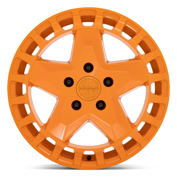 Front Face View Of 17" Victor Equipment Alpen Cast Aluminum Concave 5 Spoke Wheel In Gloss Orange with 20 Square Hole Pattern On Lip
