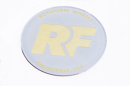 Rotiform's white and gold RF center cap insert for threaded hex nut.