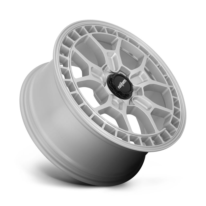 Tilted side view of a Rotiform ZMO-M monoblock cast aluminum 5 Y shape spoke automotive wheel in a gloss silver finish with a square hole pattern to the outer edge and a black center cap with a silver Rotiform logo.
